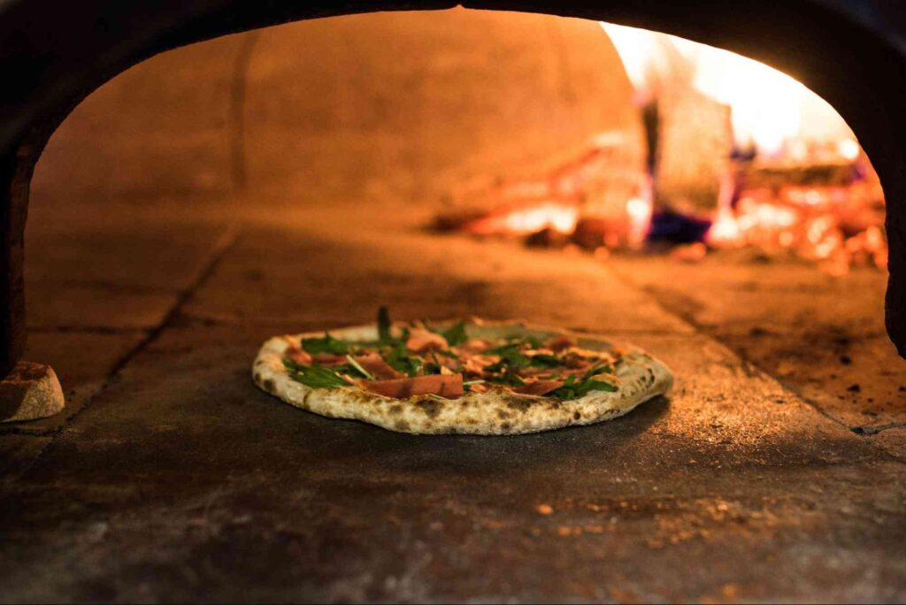 fresh pizza in a wood-fired oven