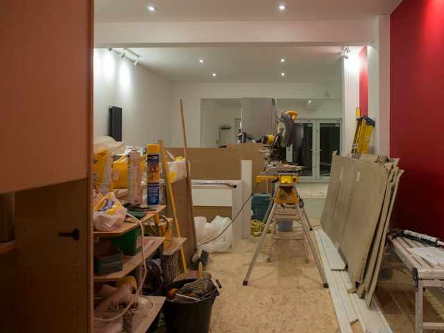 a-room-that-is-being-remodeled-with-red-walls